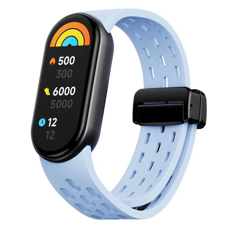 Light blue perforated silicone watch band for Xiaomi Smart Band 9 with black folding buckle
