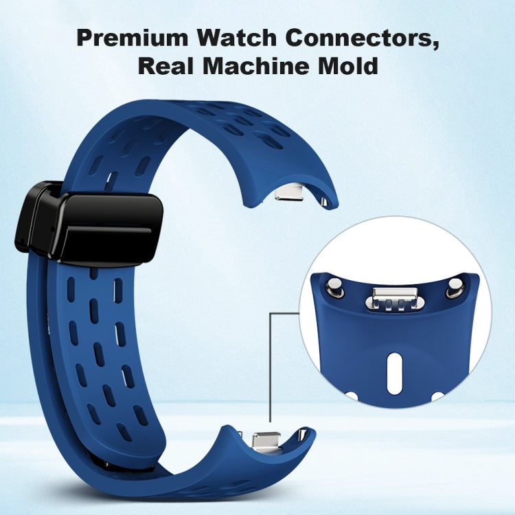Dark blue perforated watch band with connector hardware shown in close-up