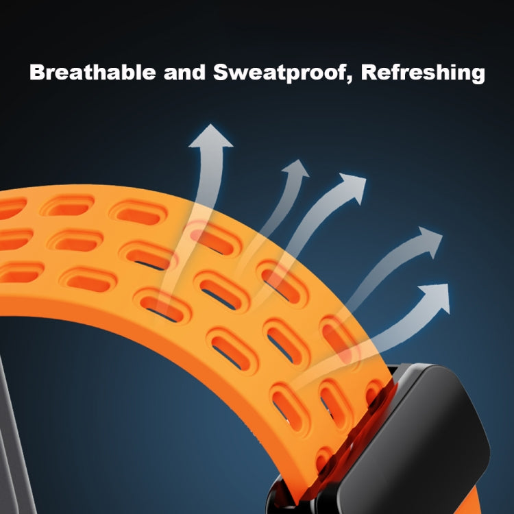 Orange perforated silicone watch band with black connector, shown in close-up