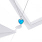 Sterling silver necklace with deep blue heart pendant and scalloped beaded border