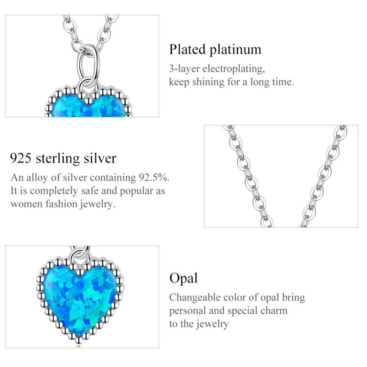 Sterling silver heart pendant necklace with deep blue gemstone and round chain links
