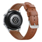 Tan leather watch strap with stitching, perforations, and metal pin buckle