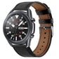 Black leather replacement watch strap with perforations and metal pin buckle