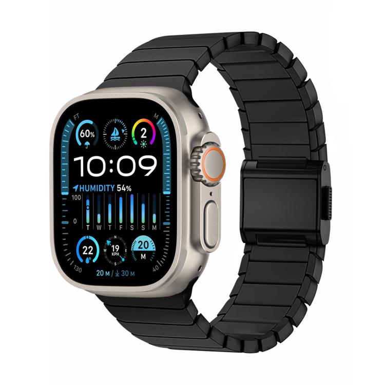Black titanium link watch band on an Apple Watch, shown with its clasp closed.