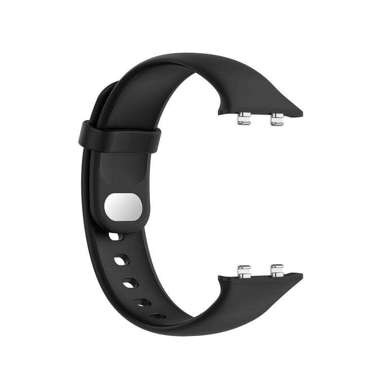 Black silicone watch strap with gray buckle loop and connector end visible