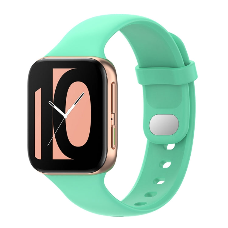 Mint green silicone smartwatch replacement strap with buckle and perforated holes
