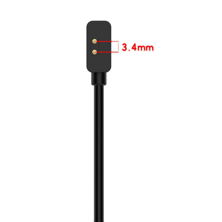 Close-up of the black xDfind cable's two-pin watch connector, with 3.4 mm spacing marked