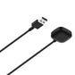 Reverse side of a black magnetic watch charging pad with USB-A cable