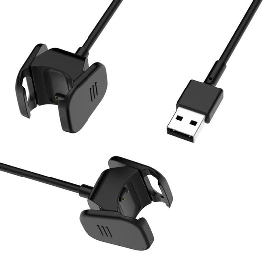 Black watch charging clip and USB-A plug on a Fitbit Charge 3/4 cable