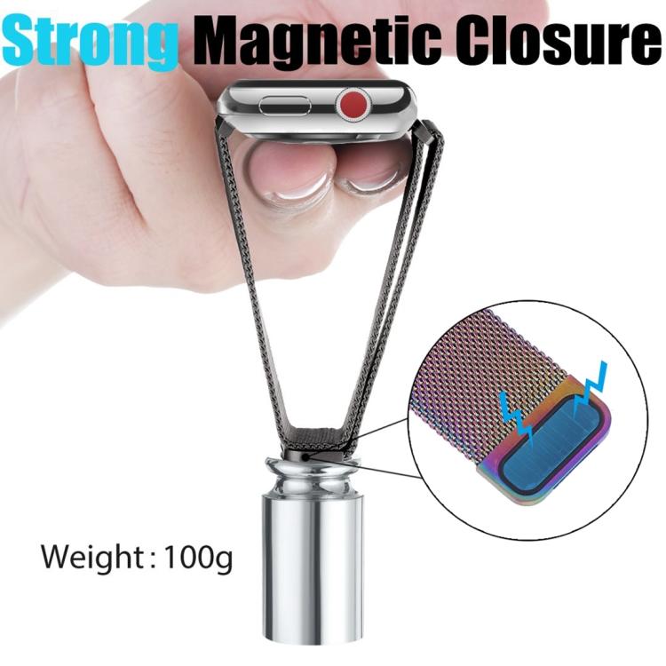 Dark metal Milanese watch band demonstrating its magnetic closure
