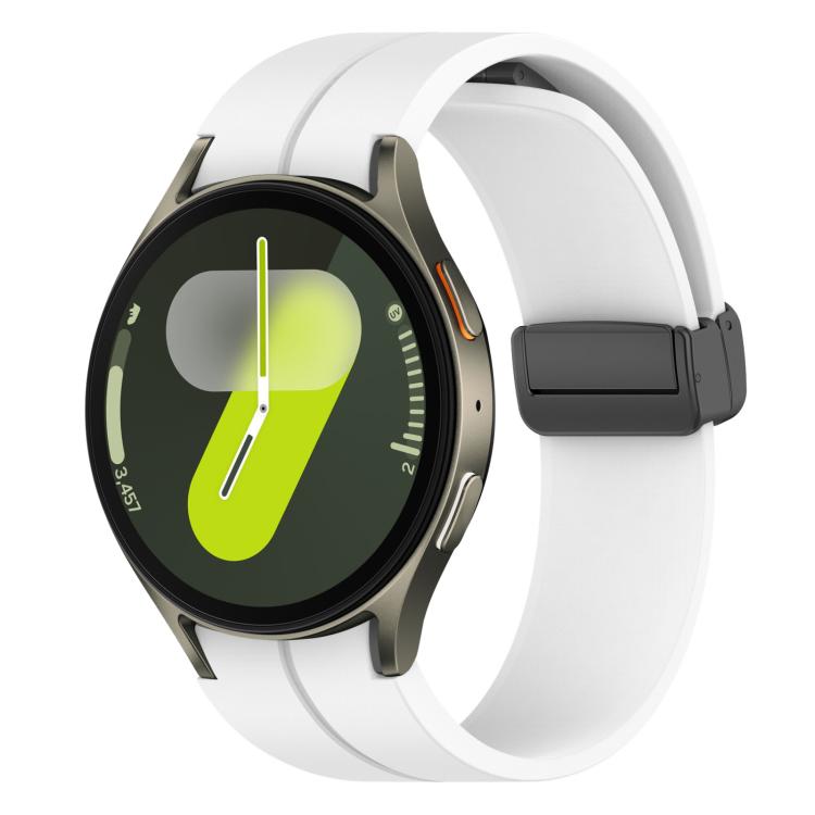White silicone watch band with black magnetic buckle on a round smartwatch