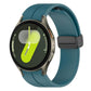 Teal silicone Samsung watch band with black magnetic buckle on a smartwatch