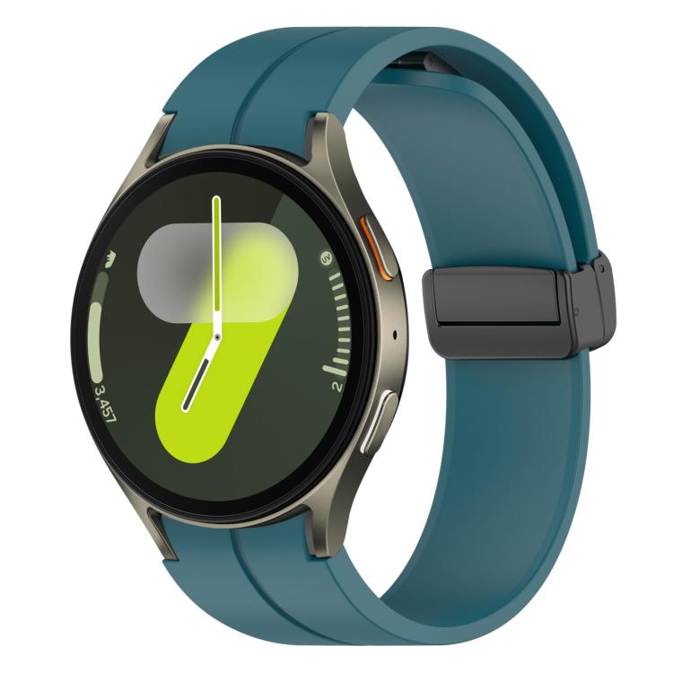 Teal silicone Samsung watch band with black magnetic buckle on a smartwatch