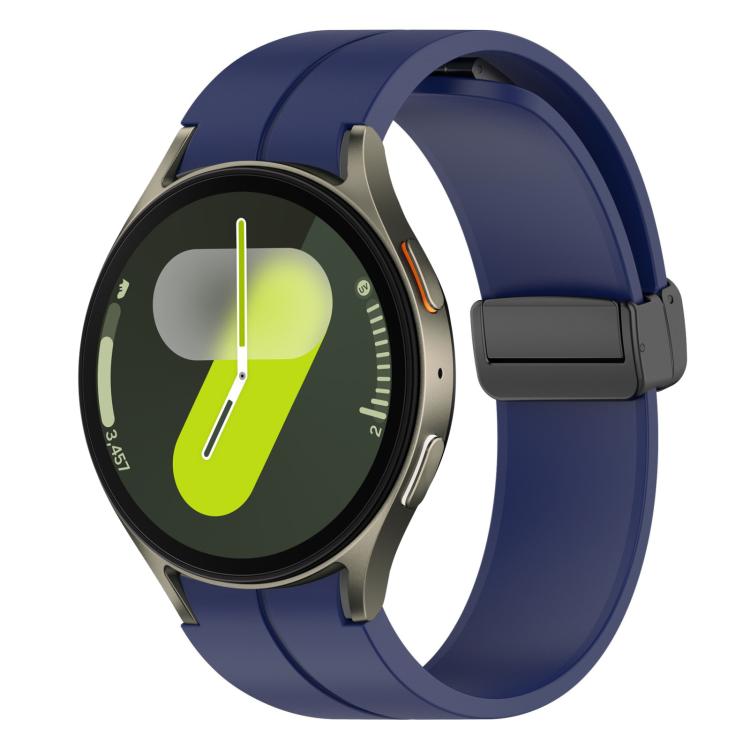 Midnight blue silicone watch band with black magnetic buckle on a round smartwatch