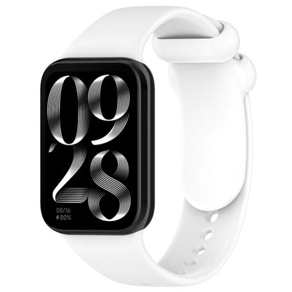 White silicone smartwatch band with buckle, shown attached to a black smartwatch