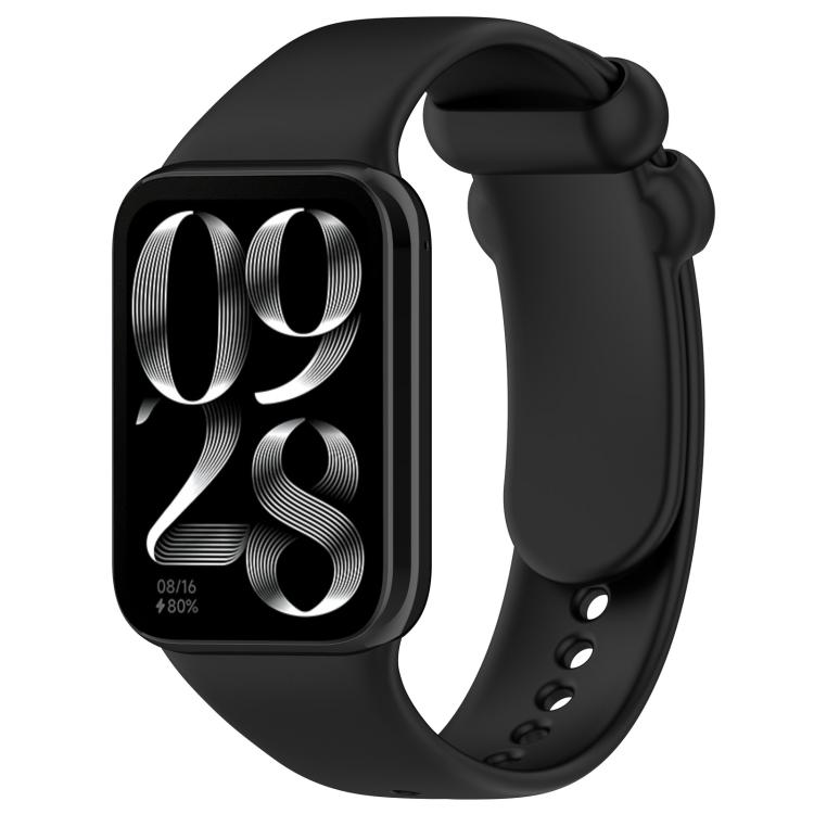 Black silicone smartwatch band with buckle, shown attached to a black smartwatch