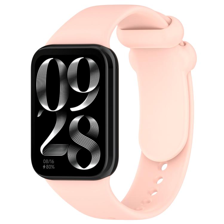 Light pink silicone smartwatch band with buckle, shown attached to a black smartwatch