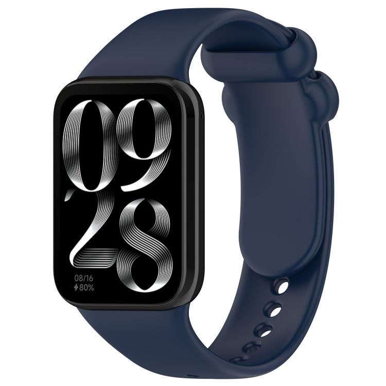 Navy silicone watch band with black smartwatch, loop closure and adjustment holes