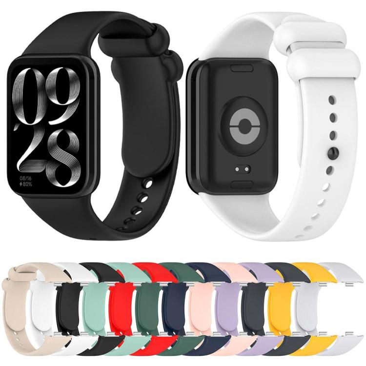 Silicone watch bands in black and white shown on both sides, with other colors below