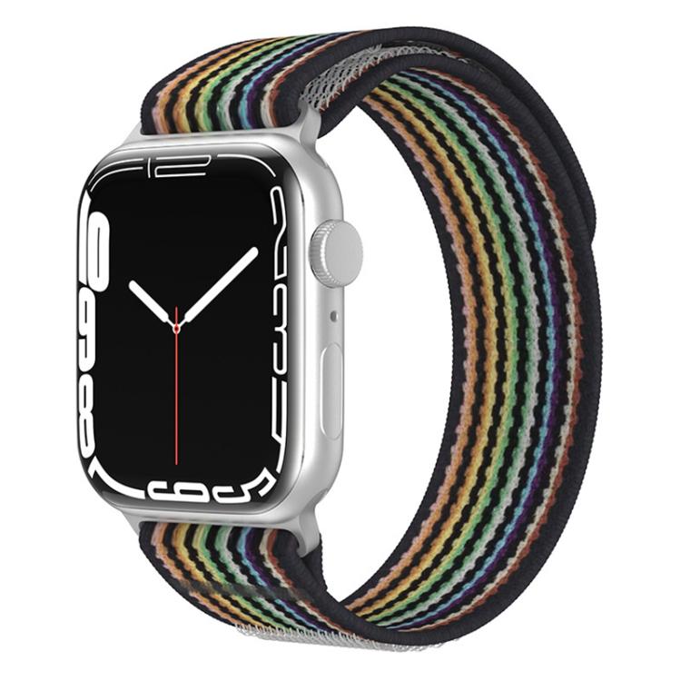Black nylon loop watch band with multicolor stripes on a silver smartwatch