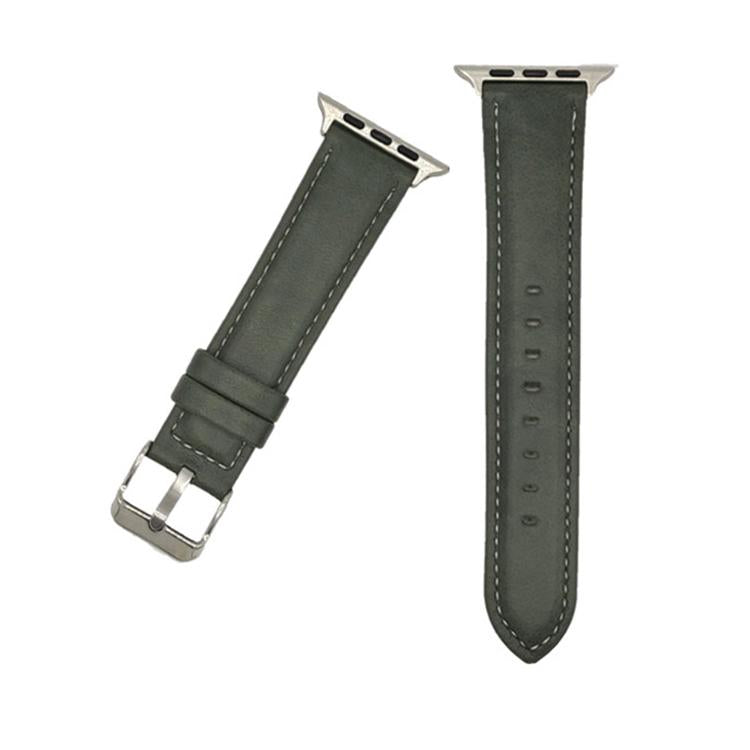 Green leather watch band with white stitching, silver buckle, and adjustment holes.