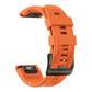 Orange silicone sport watch band with adjustment holes and dark buckle