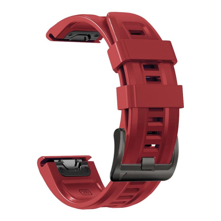 Red silicone sport watch band with adjustment holes and dark buckle