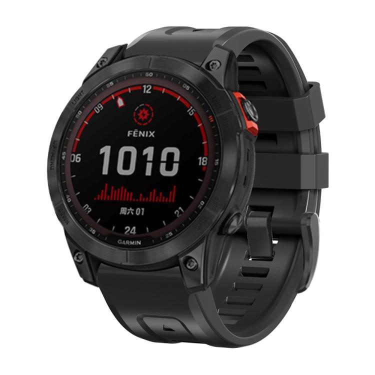 Black Garmin sports watch with a black silicone band