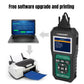 OBD2 diagnostic scanner connected to a computer for printing, handheld black device