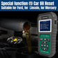 KONNWEI KW470 OBD2 scan tool beside engine bay with oil reset screen