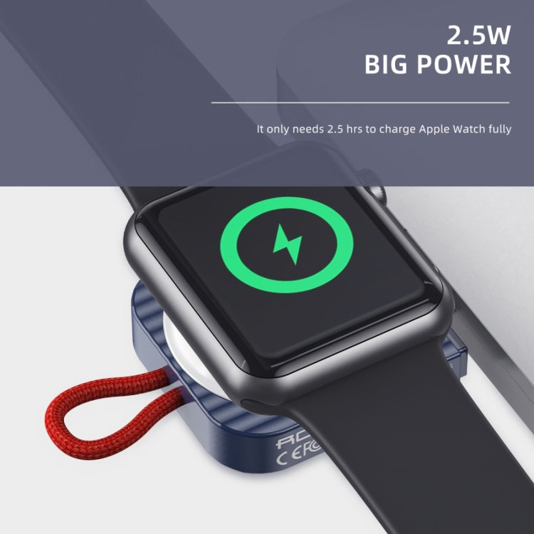 Black portable magnetic wireless watch charger with green status icon and red braided cord