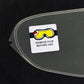 Anti-fog visor lens film applied on curved dark helmet shield, with “remove film before use” label