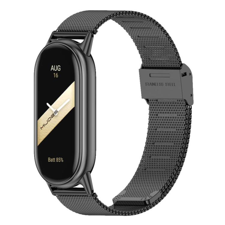 Black Milanese metal watch band with buckle, shown on a slim fitness tracker