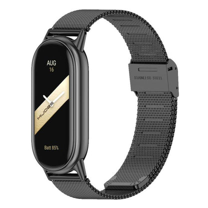 Black Milanese metal watch band with buckle, shown on a slim fitness tracker