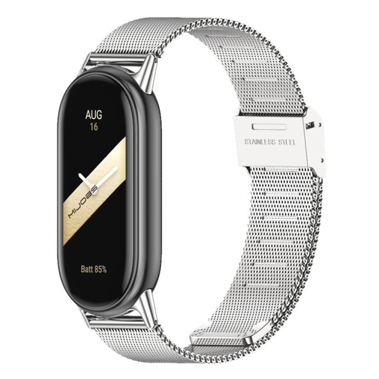 Silver Milanese metal watch band with buckle, shown on a slim fitness tracker