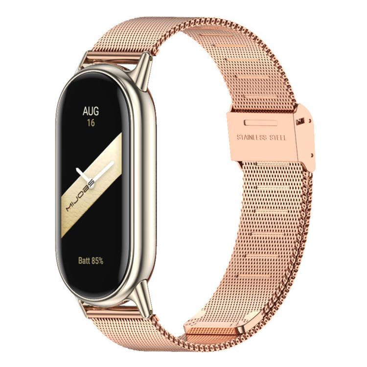 Rose gold Milanese metal watch band with buckle, shown on a slim fitness tracker