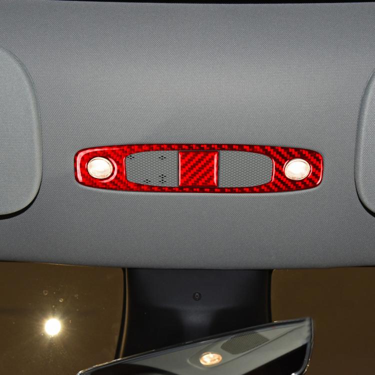 Red carbon-fiber reading light panel cover installed on car overhead console