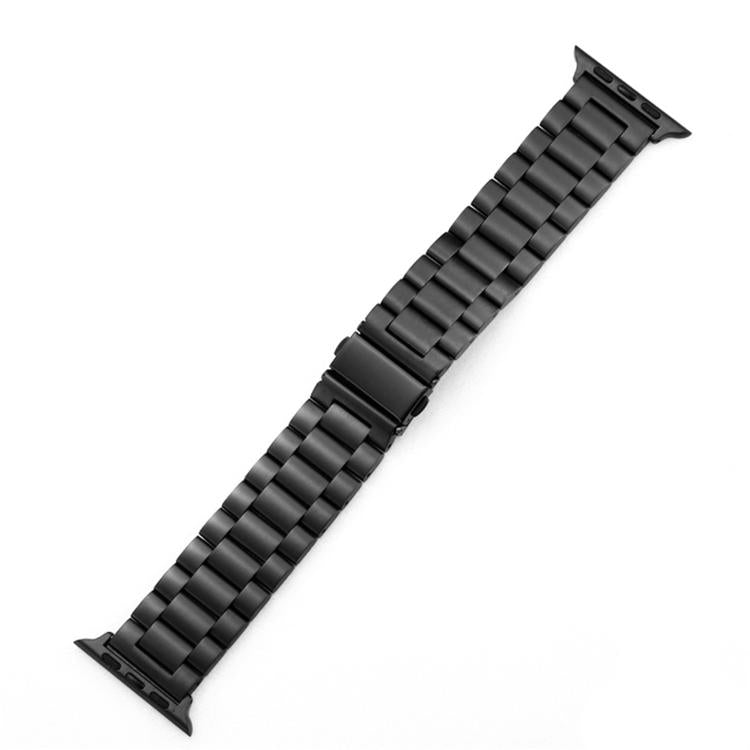 Black stainless steel watch band laid flat, showing its linked design and buckle