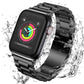 Black stainless steel watch band with linked beads and fold-over clasp on a watch