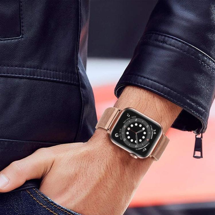 Rose gold Milanese metal watch band worn on a smartwatch