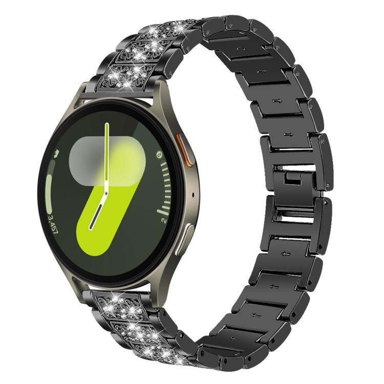 Black jeweled stainless steel watch band fitted to a round smartwatch