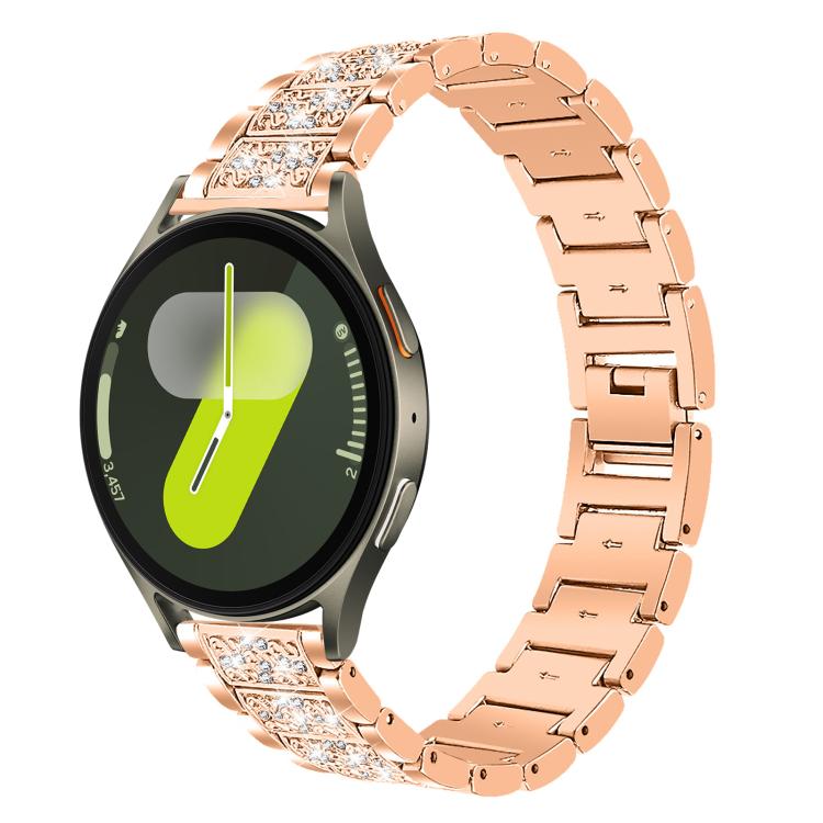 Rose gold jeweled stainless steel watch band fitted to a round smartwatch with a bright dial