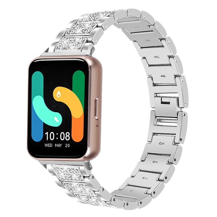 Silver jeweled stainless steel watch band fitted to a rectangular smartwatch