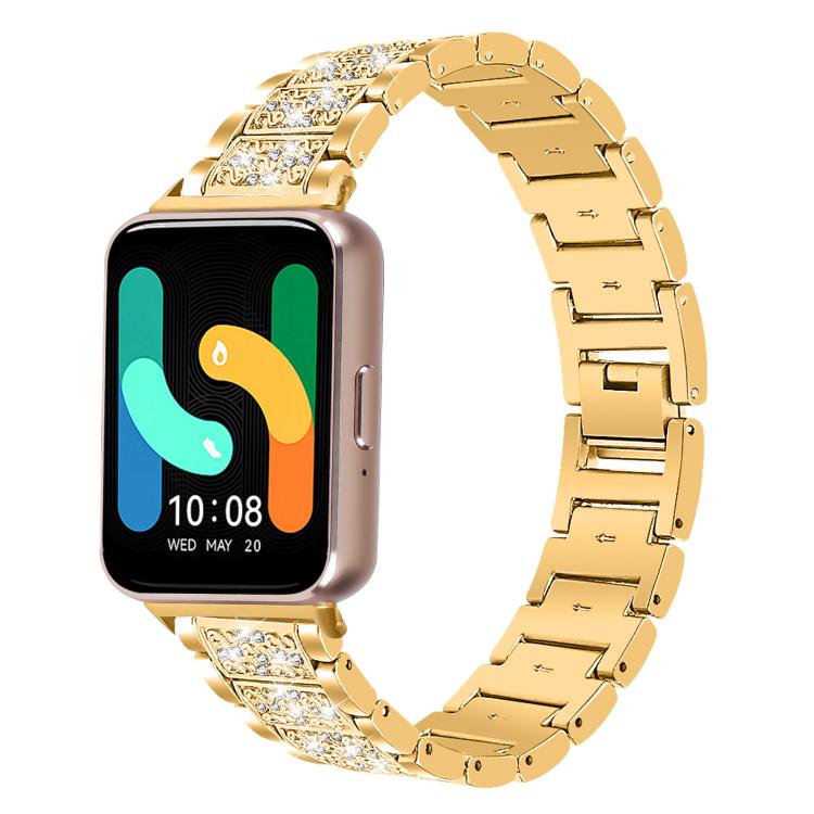 Gold jeweled stainless steel watch band fitted to a rectangular smartwatch