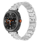 Silver jeweled stainless steel watch band fitted to a round smartwatch