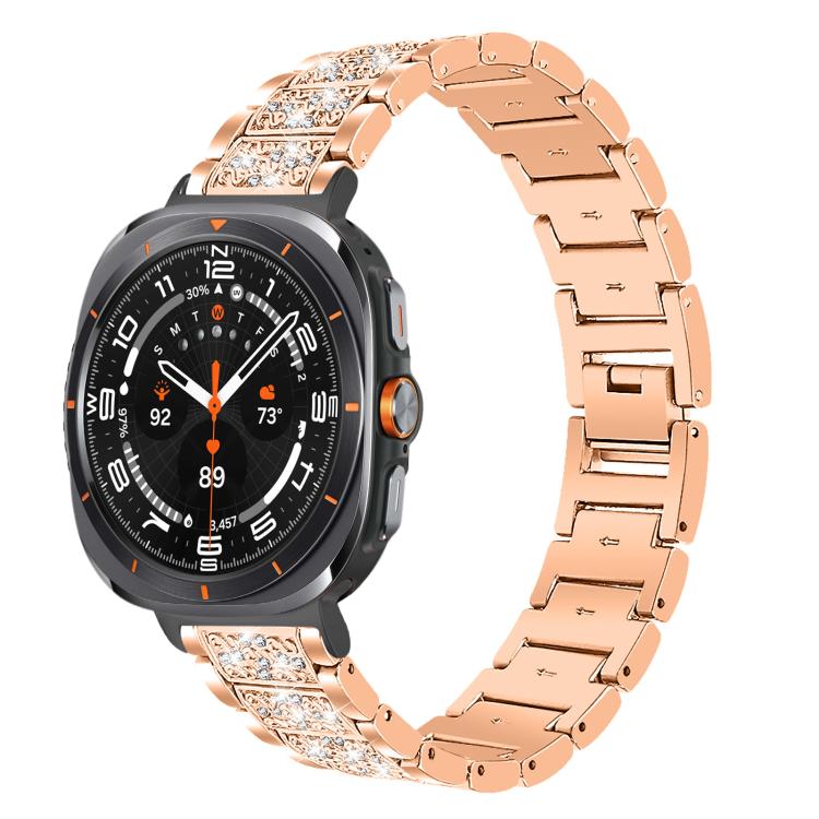 Rose gold stainless steel watch band with crystal accents on a round smartwatch
