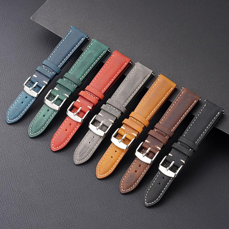 Leather watch bands in blue, green, red, gray, tan, brown, and black