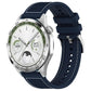 Midnight blue hybrid nylon and silicone watch band with stitched panels and adjustable holes, shown on a watch.