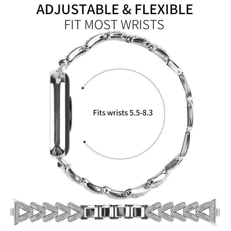 Adjustable silver metal watch band with crystal-studded arrow-shaped links