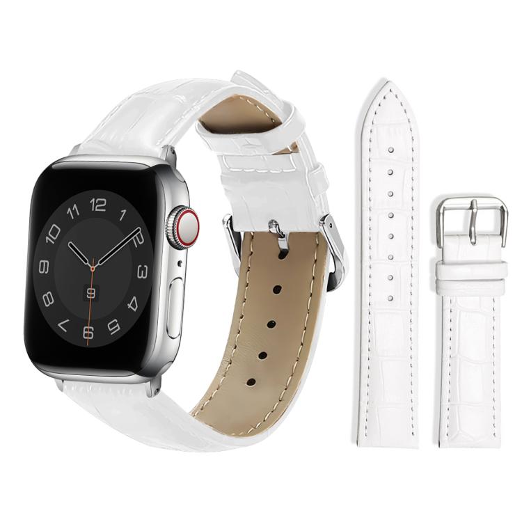 White textured leather watch band with silver pin buckle, shown attached to a watch.